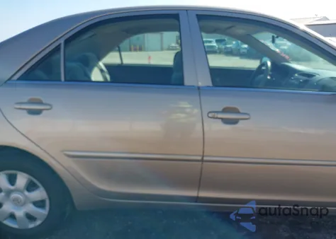 2002 Toyota Camry Le from USA, damaged, VIN 4T1BE32K22U043790